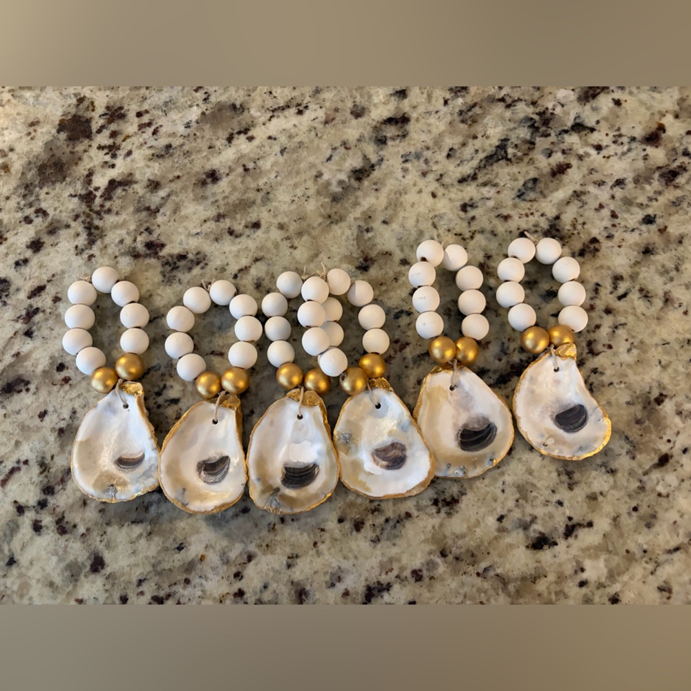 NEW Set of 6  Oyster Shell Napkin Rings
Perfect for coastal tables